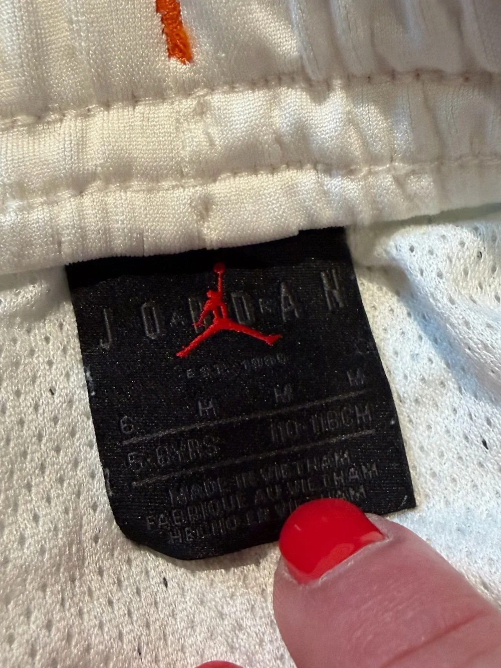 Jordan White Tee with Orange-Trim Mesh Shorts